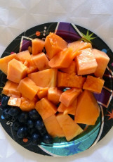 My first meal after the detox: papaya and blueberries. -Coach Nadia