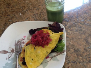 Second post detox day brunch: fresh greens topped with a two egg omlet that's filled with spinach, mushrooms, and green onions. Happy Eating! - Melissa