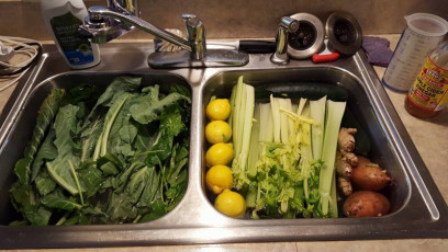 Washing veggies for detox soup and juices. - Alicia